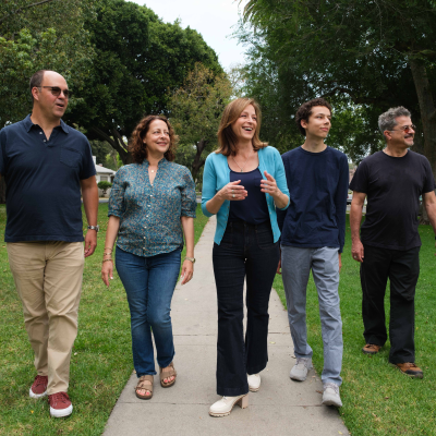 Jeannine Wisnosky Stehln takes a walk in Carlson Park with friends